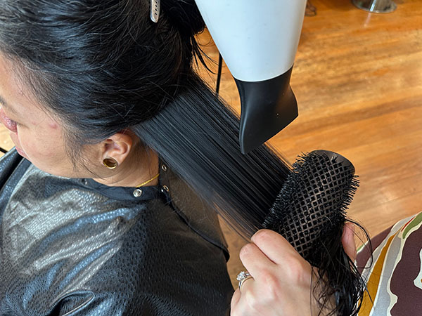 Blow dry with round brush